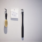 Shoehorn and clothes brush